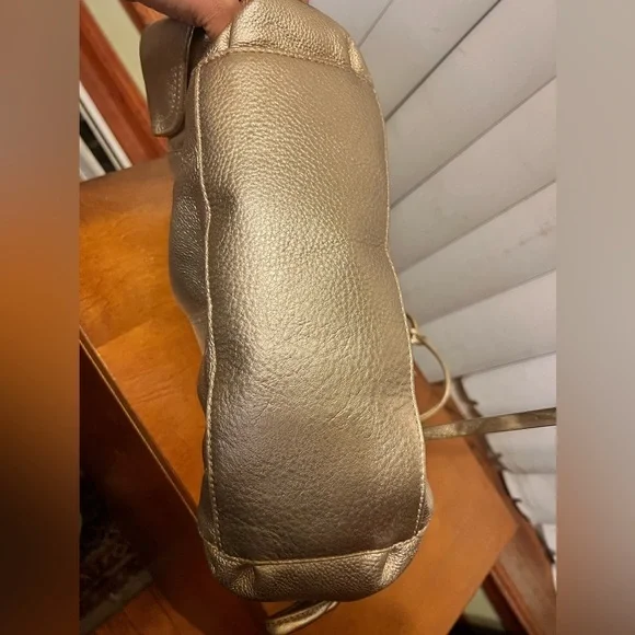 Michael Kors Metallic Gold Leather Drawstring Shoulder Bag. - Picture 14 of 16